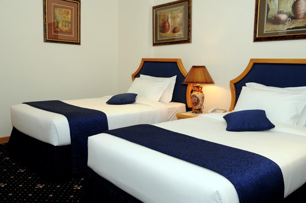 Cayam Hotel Doha Chambre photo